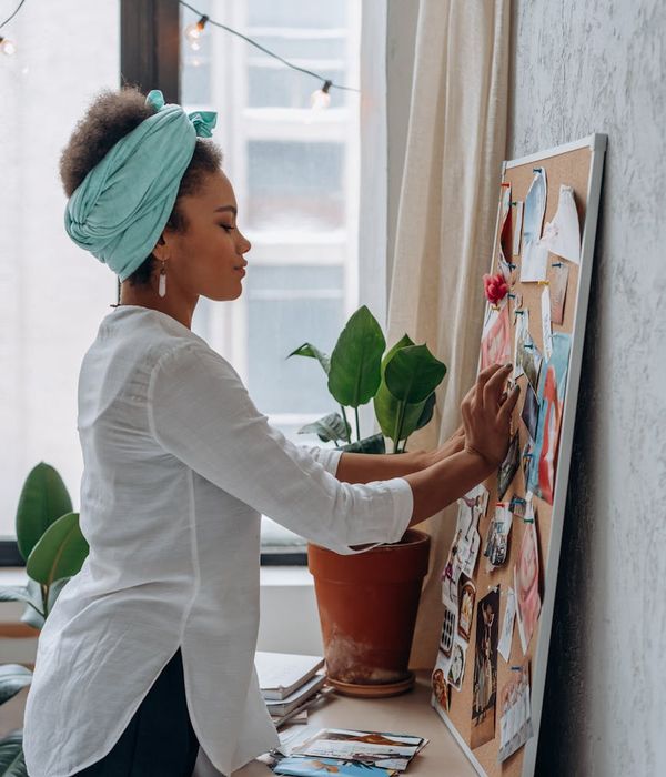 Woman in a peaceful yoga pose in a modern studio.